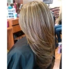 A full-length, slightly curly, mixed color gradient gray-white synthetic wig for women in Europe and America Application Scenario